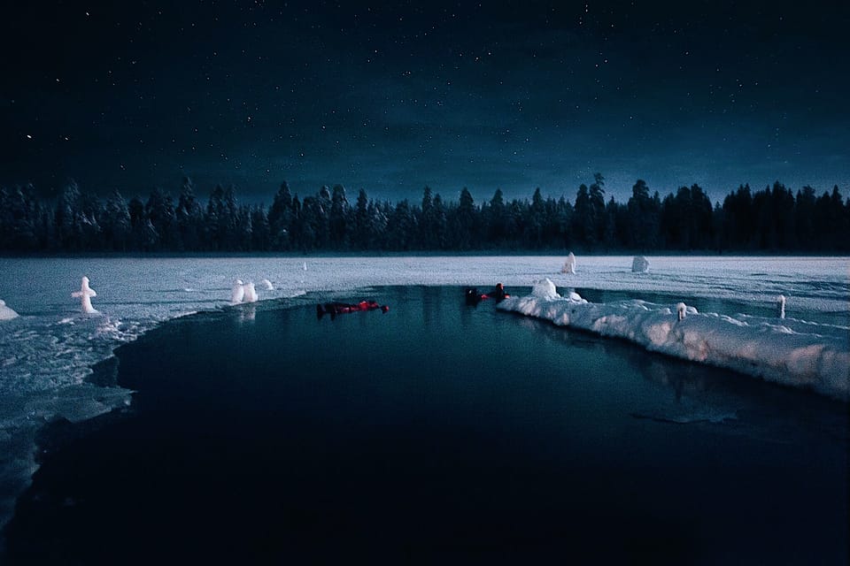 From Rovaniemi: Ice Floating under Aurora Borealis - The floating time: how you stay dry (and why 0°C doesn’t feel as scary)