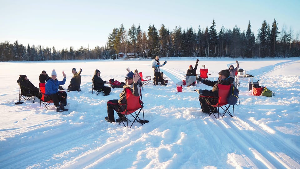 Ice fishing program in Lapland - Your 3-hour flow: from drilling a hole to sitting by the fire