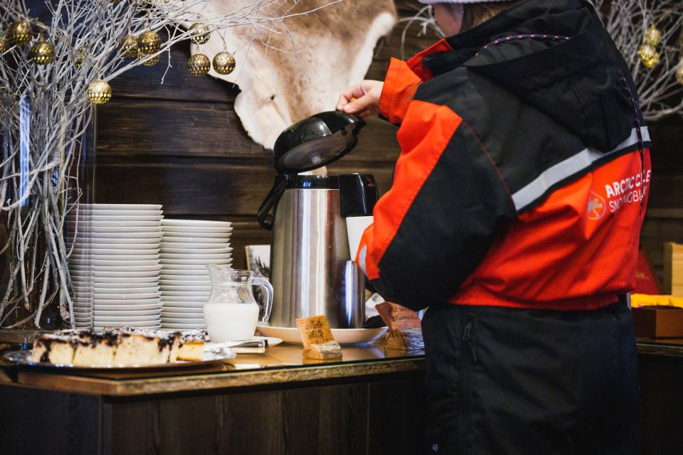 Rovaniemi: Arctic Circle Highlights by Snowmobile - A Full Lapland Day: Snowmobile Action Plus Santa Claus Village Magic