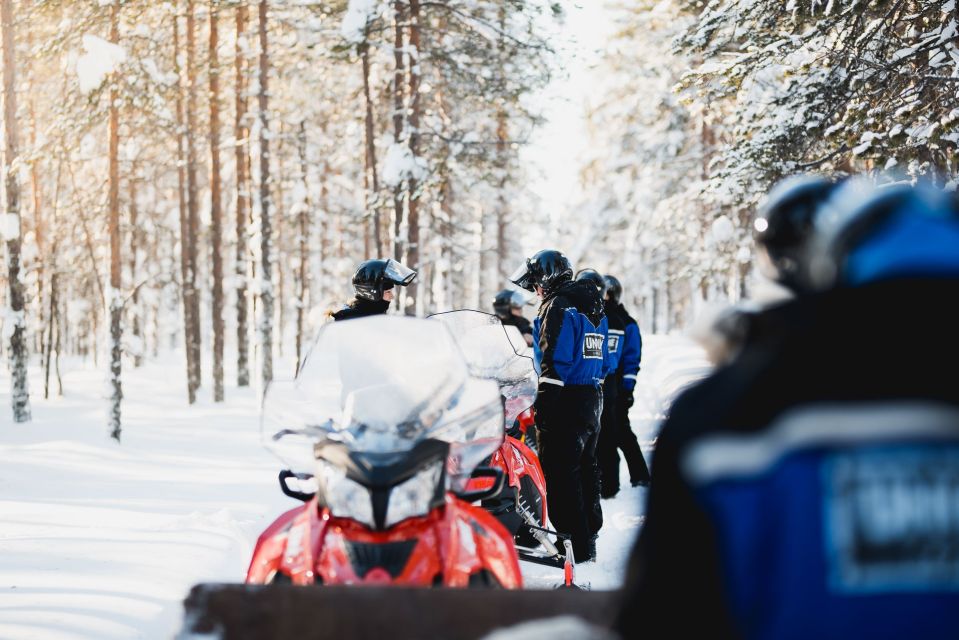Rovaniemi: Easy Snowmobile Safari - Family Setup: Adults Drive, Kids Ride in a Sleigh Behind the Guide