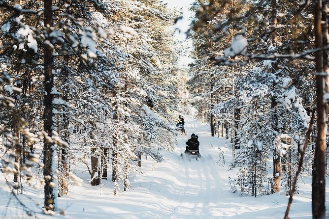 Snowmobile Safari into the Arctic Circle Forest - Where you meet and how pickup works in Rovaniemi